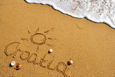 Croatia sign on the sand beach, summer backgroundの写真素材