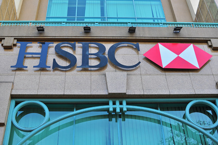 HO CHI MINH, VIETNAM - MARCH 7: Logo of HSBC Bank office in Ho Chi Minh city centre on March 7, 2015. HSBC is a British multinational banking company.のeditorial素材