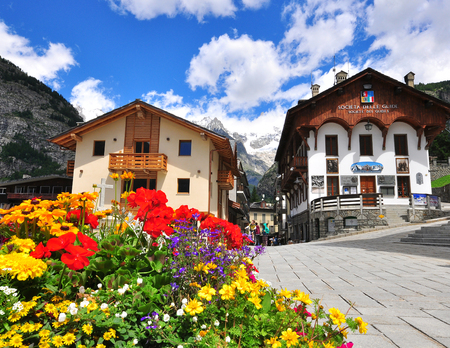 COURMAYEUR, ITALY - JUNE 23: View of the town square in Courmayeur on June 23, 2015. Courmayeur is a resort in Val d'Aosta located in italian Alps.のeditorial素材