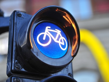 Bike symbol in the city traffic lightの写真素材