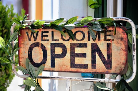 Welcome open sign in the street cafeの写真素材