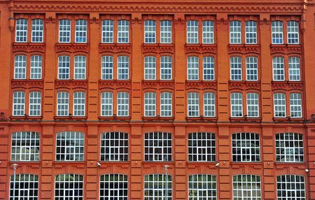 Windows of the red brick house in Moscow, Russiaのeditorial素材
