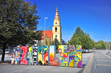 ZVOLEN, SLOVAKIA - SEPTEMBER 26: View of city welcome sign and church in Zloven, Slovakia on September 26, 2018.のeditorial素材