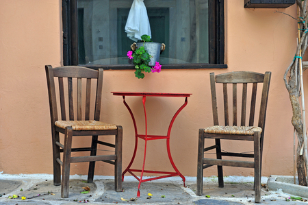 Two chairs and table at the house, Naxos, Greeceの写真素材
