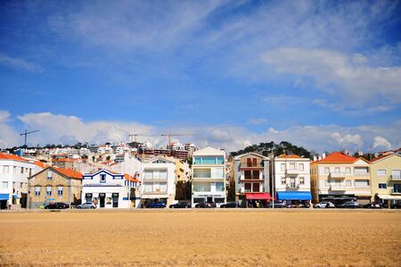 NAZARE, PORTUGAL - APRIL 1: Houses on embankment of Nazare resort, Portugal on April 1, 2019.のeditorial素材