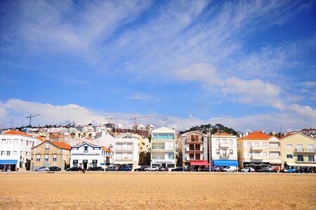 NAZARE, PORTUGAL - APRIL 1: Houses on embankment of Nazare resort, Portugal on April 1, 2019.のeditorial素材