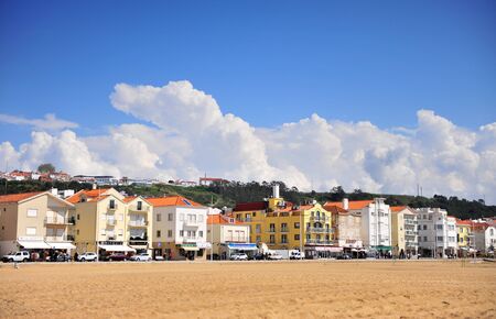 NAZARE, PORTUGAL - APRIL 1: Houses on embankment of Nazare resort, Portugal on April 1, 2019.のeditorial素材