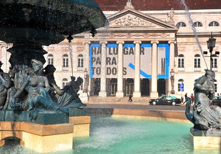 LISBON - FEBRUARY 14: Scenic Facade of National theatre with fountain water drops on Rossio square, Lisbon on February 14, 2019.のeditorial素材
