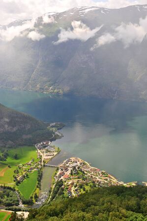 Auland town between water and mountains, fjouds, Norwayの写真素材