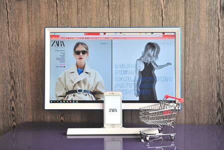 Yaroslavl, Russia - August 14, 2019: Mobile phone with Zara logo and website of retailer on monitor on August 14, 2019.のeditorial素材