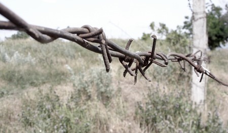 Chernobyl, barbed wire, Dirty broken abandoned places, vacant lots, contaminated land, fence posts, old post-Soviet spacesの写真素材