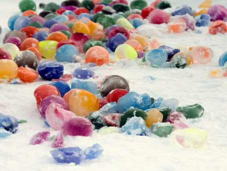 Colour balls of ice on a snow