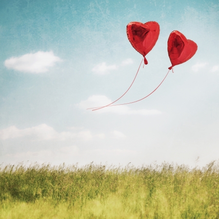 Love Heart balloon in vintage blue sky の写真素材
