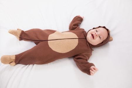Portrait of the child in a suit of a bearの写真素材