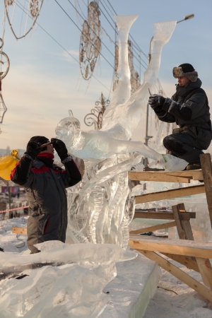 KRASNOYARSK, RUSSIA - JAN 18, 2014: Exhibition of paintings winter theme. Festival "Magic ice of Siberia" in Krasnoyarsk.のeditorial素材