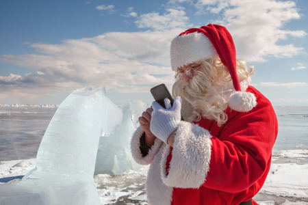 Santa Claus  that calls to whom by phone の写真素材