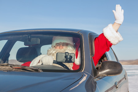  Portrait of Santa Claus in the car, shooting was conducted in a sunny day on lake Baikalの写真素材