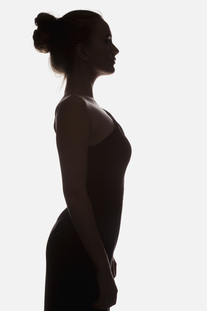 Women profile silhouette on a white backgroundの写真素材