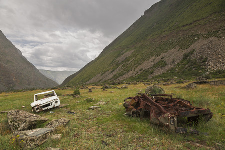 Abandoned old broken car near the pass Katu-Yaryk in the Altai Republic, Russiaの写真素材
