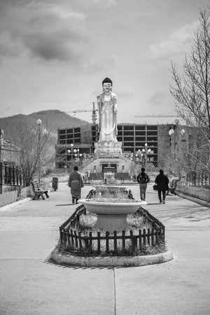Golden statue of young Buddha near the hill Zaisan in , BUDDHA PARK, center of cultural and religious heritage Zanabazarのeditorial素材