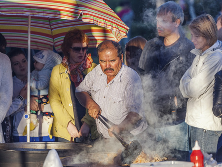 Krasnoyarsk, Russia - September 03 2016: People queue for a beer at the festival meal "summer kitchen" on the mountain Pokrovskayaのeditorial素材