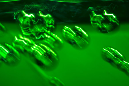 Movement of bubbles of mineral water gas in a plastic bottle, macro photography