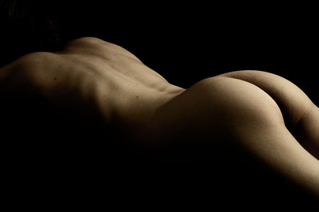 naked girl on blackの写真素材