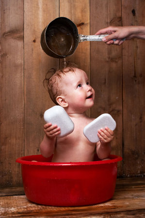 baby is washing upの写真素材