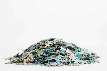 many pieces of puzzle on whiteの写真素材