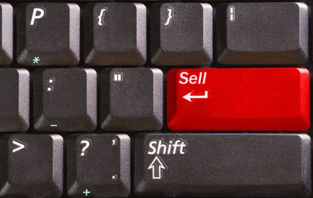 computer black  keyboard with word Sell on red buttonの写真素材