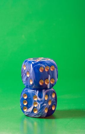 Two blue dices on greenの写真素材