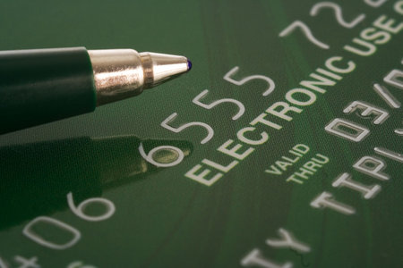 credit card with pen financial backgroundの写真素材