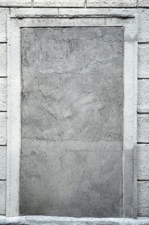 frame in old cement wall