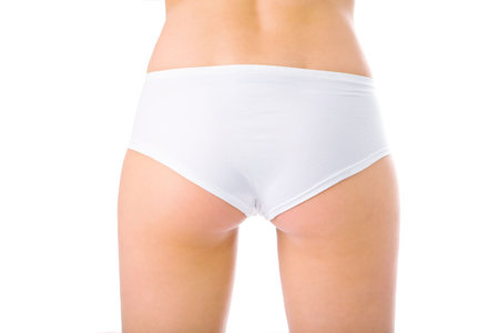 woman back in white pants on white background