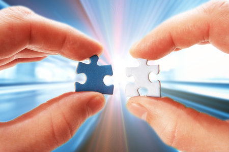 abstract moving background and hand with puzzle