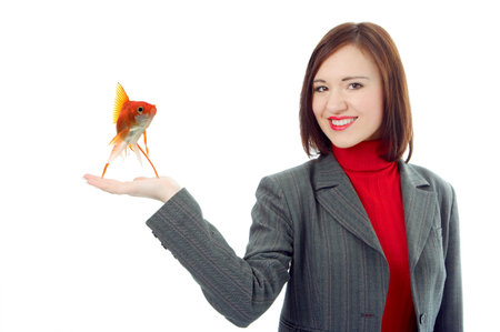 business woman with fish on white backgroundの写真素材