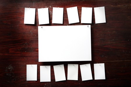 Photo paper attach nail wooden backgroundの写真素材