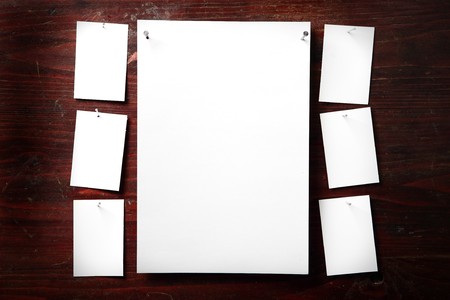 Photo paper attach nail wooden backgroundの写真素材