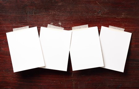 Photo paper attach to old  wooden backgroundの写真素材