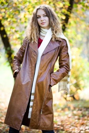 young beauty woman autumn outdoorの写真素材