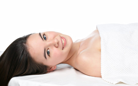 beauty young girl  day spa on white backgroundの写真素材