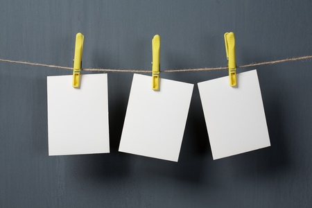 white photo paper on gray backgroundの写真素材