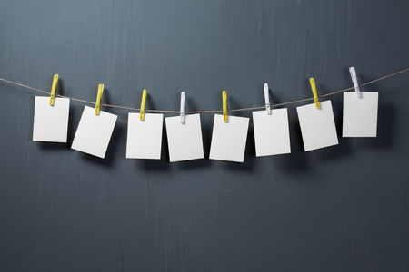 white photo paper on gray backgroundの写真素材