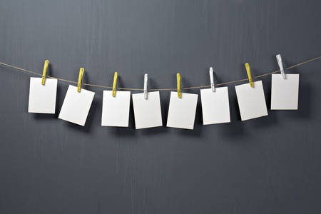 white photo paper on gray backgroundの写真素材