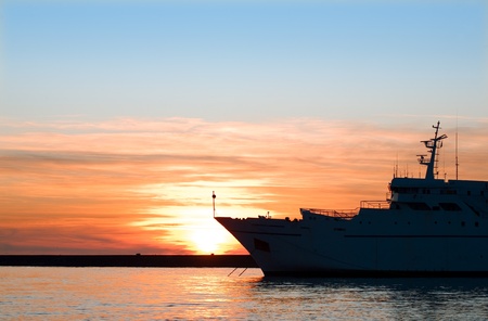 sea ship in beauty sunriseの写真素材