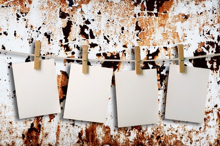 white photopaper on colours trash backgroundの写真素材