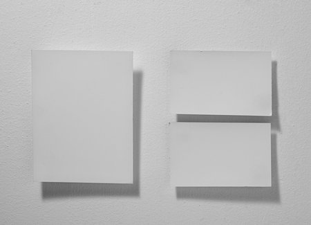 close up  white note paper on gray background