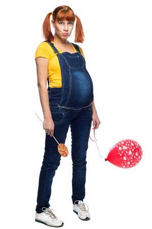 youth teen girl pregnancy over white backgroundの写真素材