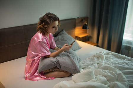 Drunk Woman In Depression Is In The Bedroom And Suffers From Anxiety Drinks Alcohol Wine Alone At Homeの写真素材