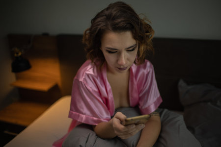 Drunk Woman In Depression Is In The Bedroom And Suffers From Anxiety Drinks Alcohol Wine Alone At Homeの写真素材